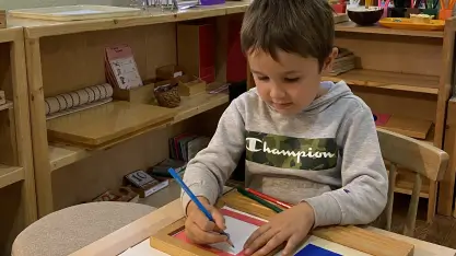 young child doing classwork