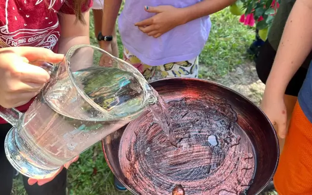 water being poured into a pan