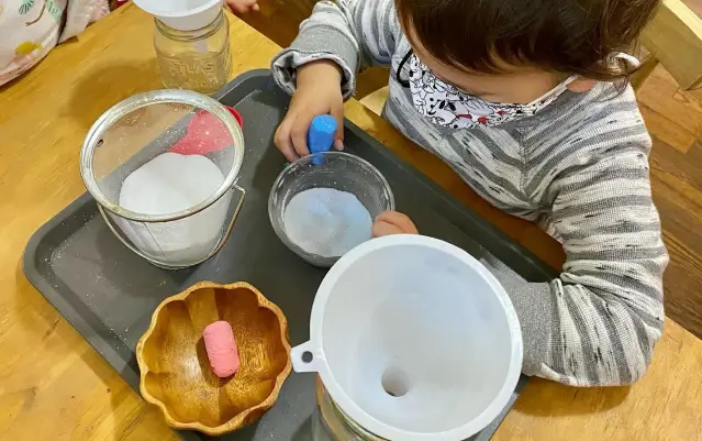 child engaged in a class room activity