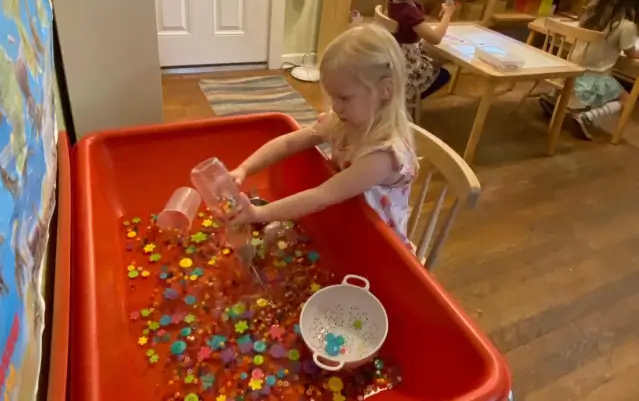 child engaged in a class room activity