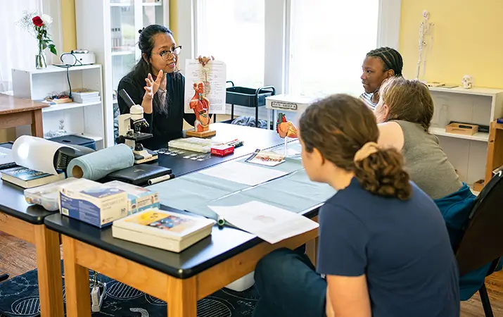 teacher and students in a classroom